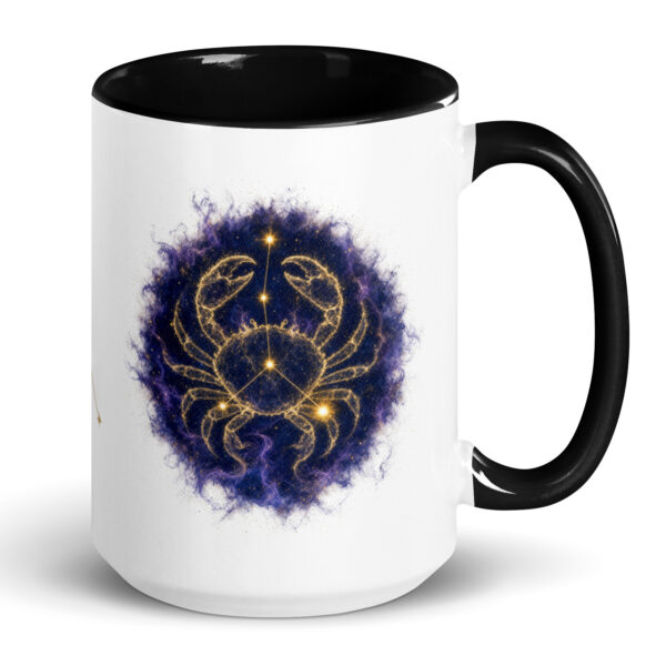 White ceramic mug with black interior and handle, showing the enlarged gold and navy Cancer constellation orb