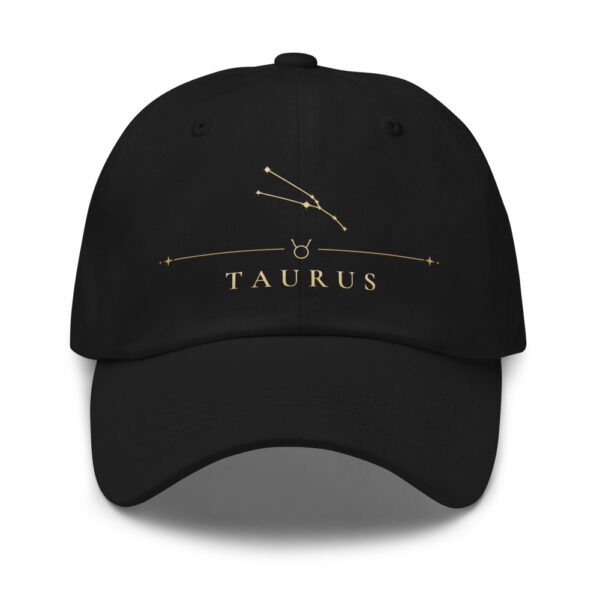 Black classic dad hat with gold Taurus constellation and TAURUS wordmark