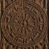 The Dendera zodiac: the circular sandstone sky-map relief from the Temple of Hathor, seen straight on and filling the whole frame edge to edge. The round disk is packed with carved Egyptian figures of the zodiac signs and planets, a ring of decan sta