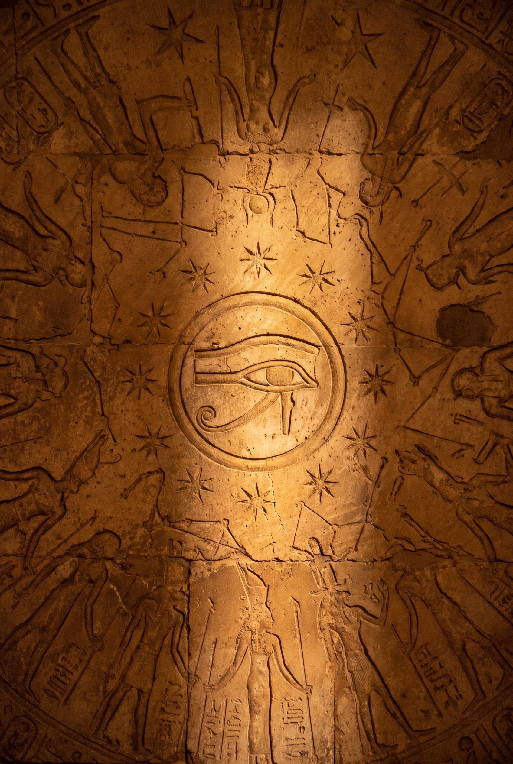 The Eye of Horus carved in a circle among stars, the sign for a lunar eclipse