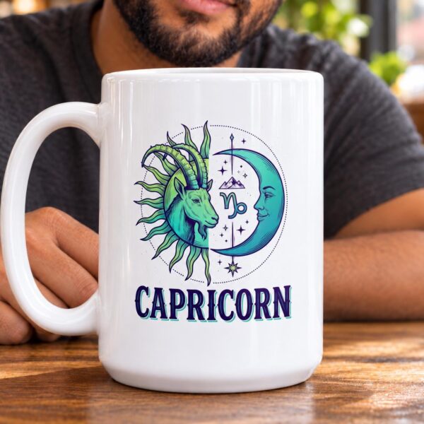 A person holding the personalized Capricorn Day & Night mug with a sun-and-moon Capricorn design