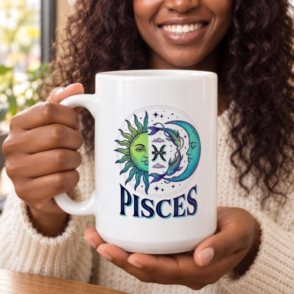 A person holding the personalized Pisces Day & Night mug with a sun-and-moon Pisces design