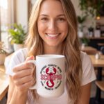 Scorpio Rose & Red Scorpion Badge Mug White Glossy Mug 15 oz, White in use: A bright café with warm natural window light